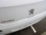 a close up of a car ' s emblem on the front of the car