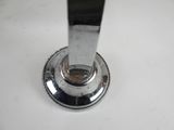 a close up of a faucet on a white counter