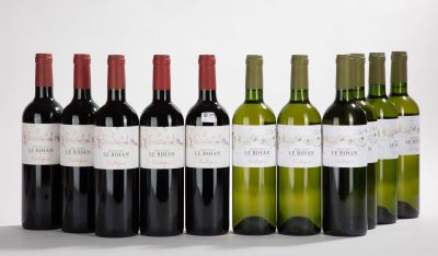 six bouteilles de vin rouge et blanc alignées les unes à côté des autres