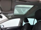 a view of the sunroof from the inside of a car