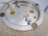 an image of a metal object with a tag on it