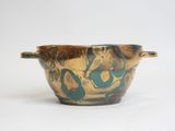 brass bowl with blue and green designs on it