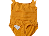 un maillot de bain une pièce jaune sur lequel se trouve une étiquette