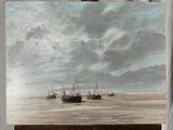 un tableau posé sur un chevalet représentant des bateaux sur l'eau