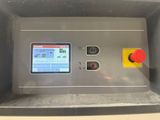 a machine that has a screen on the side of it