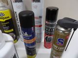 many different types of spray paint on the counter