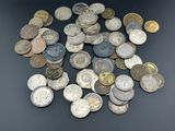 an image of a pile of old coins sitting on top of a table
