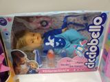 a doll that is in a box on the table