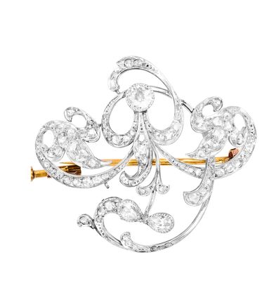 une broche en diamants et or, signée Van Cleef