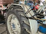 a tractor that is parked inside of a building