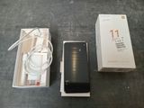 a box and a charger on the floor next to a box