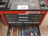 a tool box with many tools in it in the garage