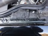 a close up of the inside of a car ' s trunk