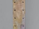 an image of a wooden ruler with holes on it