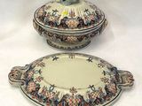 deux assiettes et un bol décorés d'un oiseau