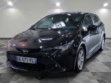 a picture of a black toyota corollant parked in a garage