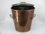 an old copper pot with handles and handles on a white background