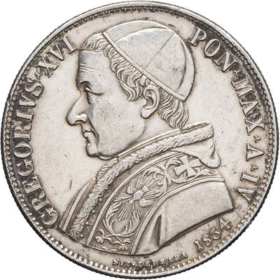 an old silver coin with a portrait of a man wearing a hat