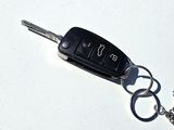 a picture of a key chain with a car key on it