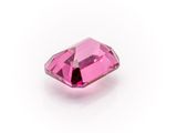 a pink diamond on a white background