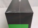 a black box with a green stripe on it