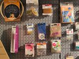 many items on the wall of a craft store