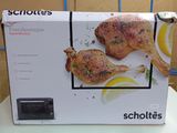 a box that is sitting on a table with a chicken in it