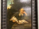 un tableau représentant un vieil homme en train de lire un livre