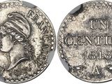 a close up of a coin with a woman ' s face on it
