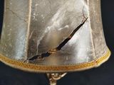 a lamp that has a crack in the middle of it