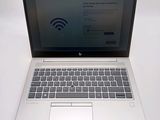a laptop with a wifi connection on the screen