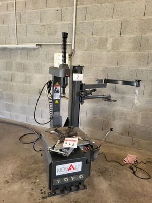 an image of a machine that is sitting in a garage