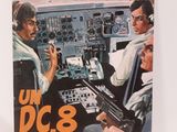 la couverture d'un magazine sur laquelle figurent un homme et une femme dans le cockpit d'un avion