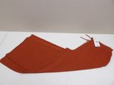 an image of a pair of red pants on a white table