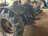 a tractor that is parked in a garage