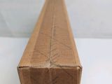a brown box with writing on it sitting on a table