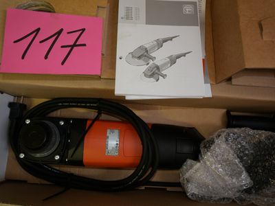 a box with a drill and other tools in it