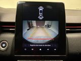 a picture of a car ' s dashboard with a camera on it