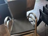 a chair that is sitting in the middle of a room