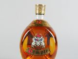 l'image d'une bouteille de whisky posée sur une table