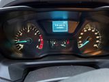 a close up of a car dashboard with a speedometer and gauges