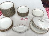 a table with a lot of plates and bowls on it