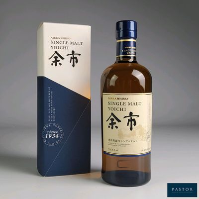 an image of a bottle of whisky next to a box