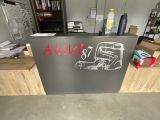 an image of a desk with a drawing of a truck on it