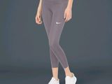 the woman is wearing a sports bra top and leggings