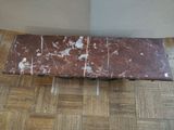 a marble slab sitting on the floor in a room