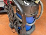 an image of a vacuum cleaner in a garage