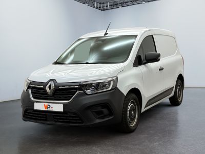 the white van is parked in a large room