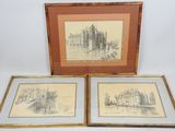 two framed drawings of a castle and a bridge