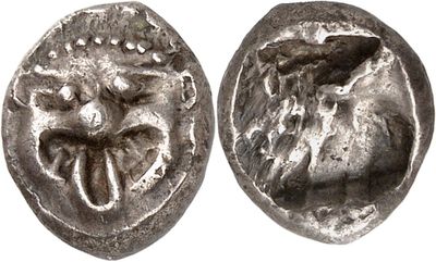 a silver coin with an image of a bird on it